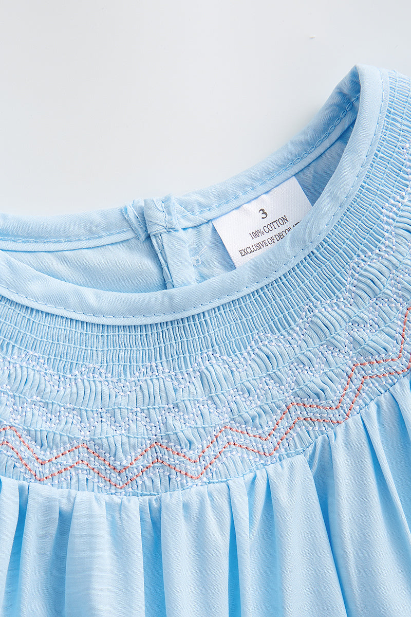 Blue smocked ruffle dress