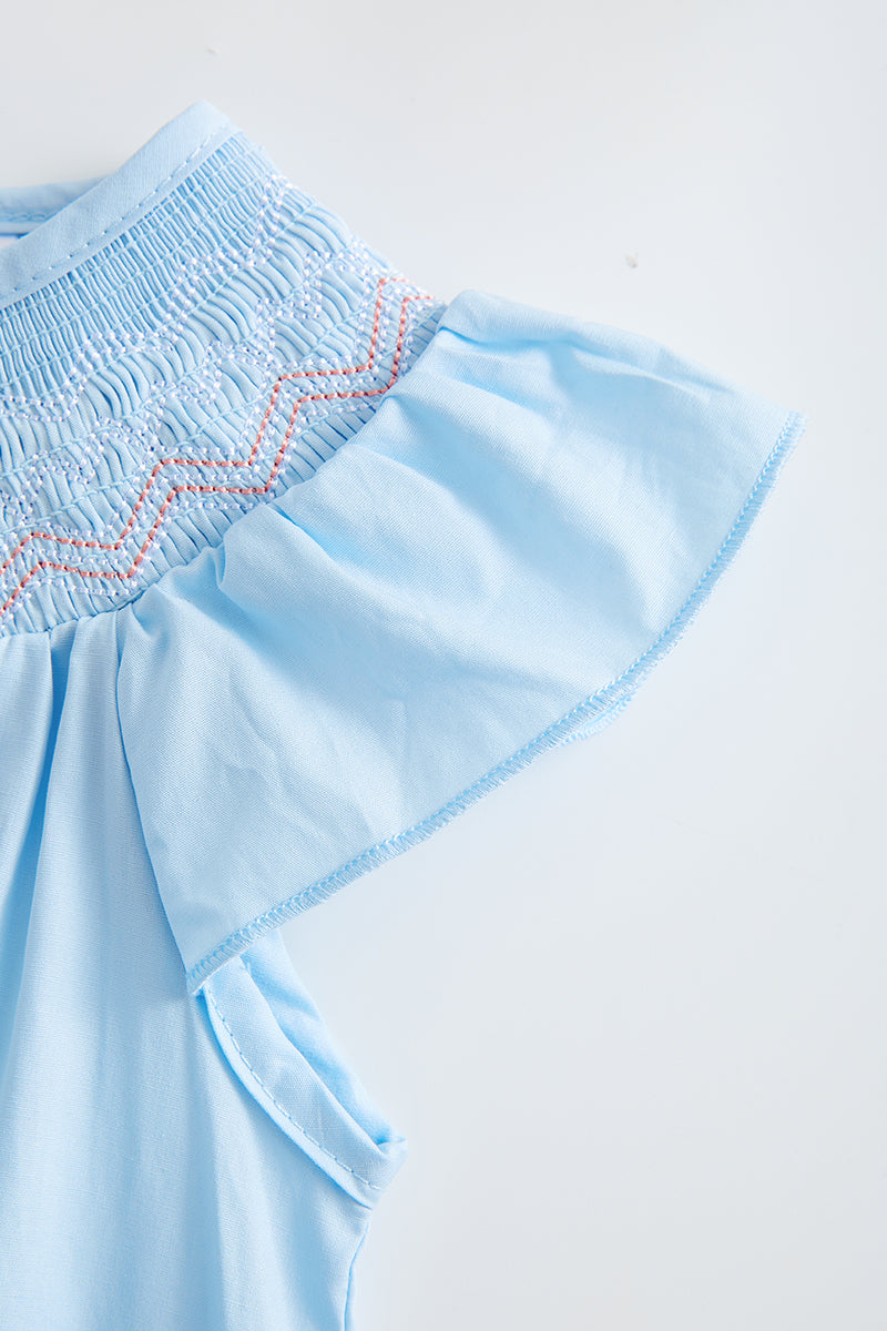 Blue smocked ruffle dress